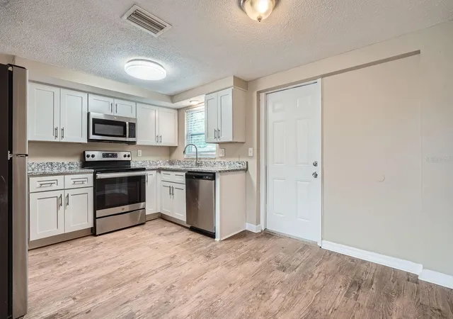 4th image of 5429 Flora Ave, Holiday, FL 34690 | MLS# O6314390