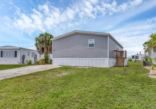 Photo 2 of Manufactured home for sale at 7337 Desant Ln, Port Charlotte, FL 33981 | MLS# D6142630 | Listing updated on 2026-07-07