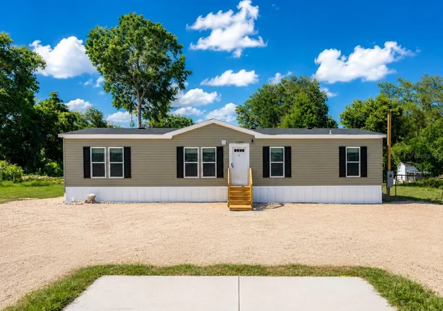 Photo 1 of Manufactured home for sale at 11307 NW 19th Lane, Ocala, FL 34482 | MLS# S5128597 | Listing updated on 2026-08-31