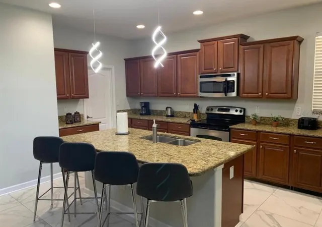 Photo 4 of Single family home for sale at 8894 Candy Palm Rd, Kissimmee, FL 34747 | MLS# O6316693 | Listing updated on 2026-08-07