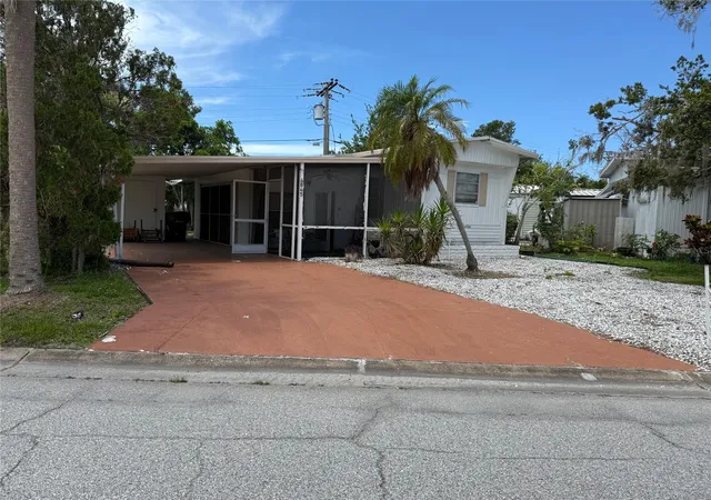 Photo 2 of Manufactured home for sale at 4845 Boca Raton Ave, Sarasota, FL 34234 | MLS# A4655608 | Listing updated on 2026-09-16