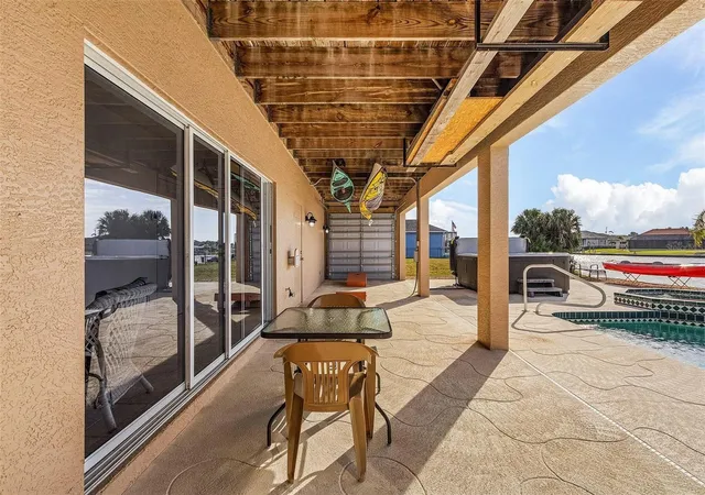 Photo 2 of Single family home for sale at 15340 Alsask Cir, Port Charlotte, FL 33981 | MLS# O6318315 | Listing updated on 2025-08-02