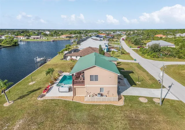Photo 3 of Single family home for sale at 15340 Alsask Cir, Port Charlotte, FL 33981 | MLS# O6318315 | Listing updated on 2025-08-02