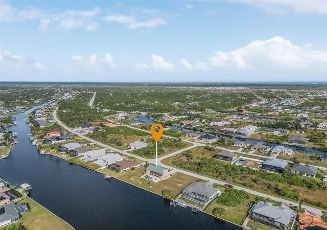 Photo 4 of Single family home for sale at 15340 Alsask Cir, Port Charlotte, FL 33981 | MLS# O6318315 | Listing updated on 2025-08-02