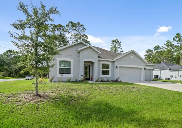 Photo 3 of Single family home for sale at 5 Bud Holw Dr, Palm Coast, FL 32137 | MLS# FC310521 | Listing updated on 2026-07-01