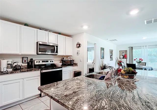 Photo 3 of Single family home for sale at 7161 SW 135th Place, Ocala, FL 34473 | MLS# O6318780 | Listing updated on 2026-08-31