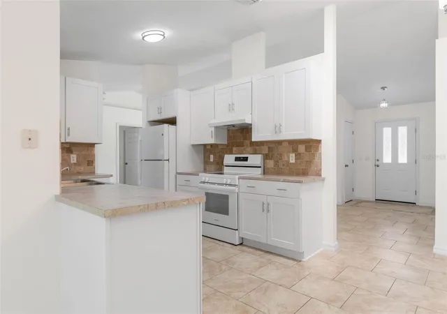 3rd image of 23 Pennfield Ln, Palm Coast, FL 32164 | MLS# FC310572