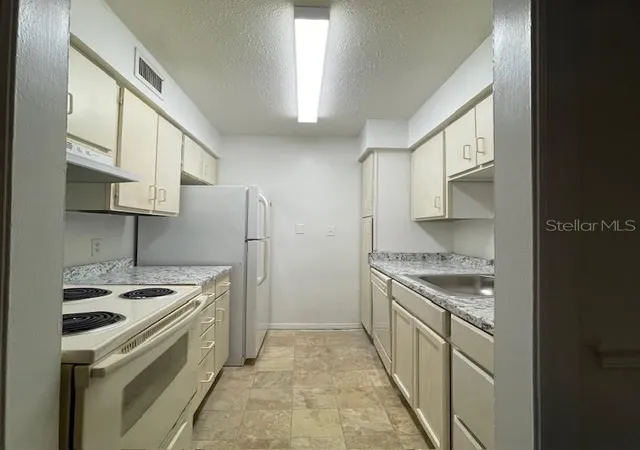 Photo 2 of Condo for sale at 415 Wymore Rd #101, Altamonte Springs, FL 32714 | MLS# O6318992 | Listing updated on 2026-02-26