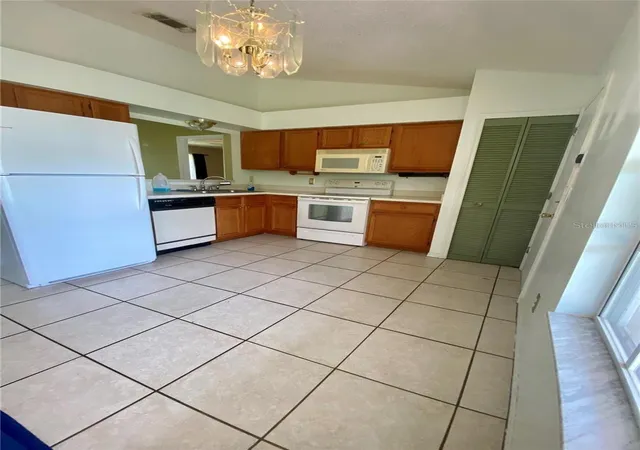 4th image of 5230 Clarion Oaks Dr, Orlando, FL 32808 | MLS# S5129239