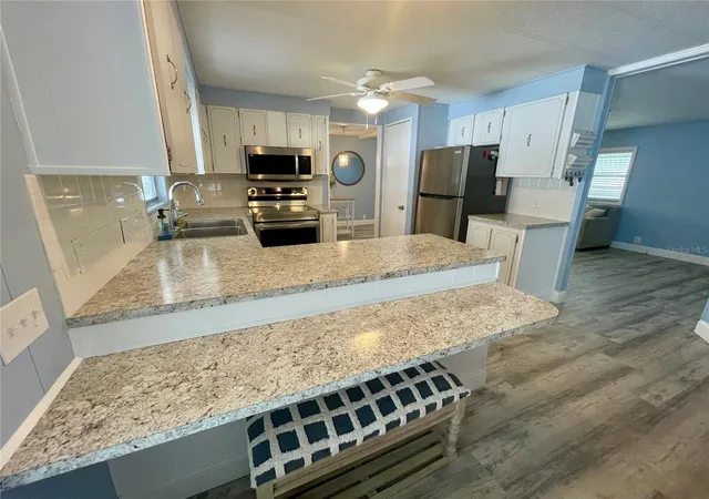 Photo 4 of Manufactured home for sale at 34645 Camphor Dr N, Pinellas Park, FL 33781 | MLS# TB8399043 | Listing updated on 2026-08-12