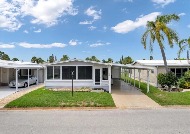 Photo 1 of Manufactured home for sale at 2100 Kings Hwy #1052, Port Charlotte, FL 33980 | MLS# C7511787 | Listing updated on 2026-10-22