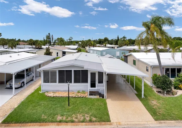Photo 2 of Manufactured home for sale at 2100 Kings Hwy #1052, Port Charlotte, FL 33980 | MLS# C7511787 | Listing updated on 2026-10-22