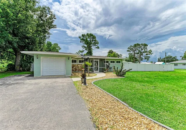 Photo 2 of Single family home for sale at 557 Reading St Nw, Port Charlotte, FL 33952 | MLS# A4657941 | Listing updated on 2026-10-08