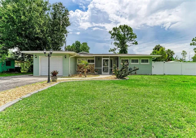 Photo 3 of Single family home for sale at 557 Reading St Nw, Port Charlotte, FL 33952 | MLS# A4657941 | Listing updated on 2026-10-08