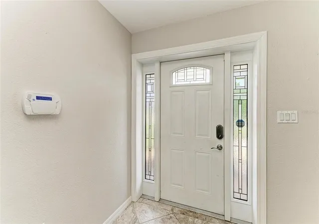 Photo 4 of Single family home for sale at 557 Reading St Nw, Port Charlotte, FL 33952 | MLS# A4657941 | Listing updated on 2026-10-08