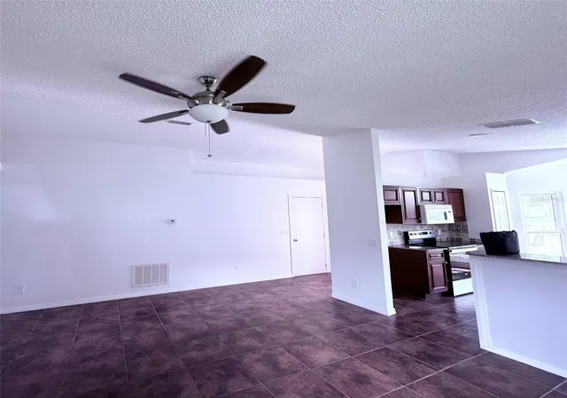 Photo 4 of Single family home for sale at 7219 Edgewater Shrs Ct, Orlando, FL 32810 | MLS# O6324605 | Listing updated on 2026-08-11