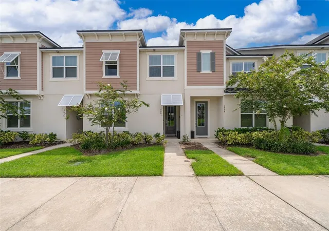 Photo 1 of Townhouse for sale at 1660 Tropical Palms Cir, Kissimmee, FL 34747 | MLS# O6325817 | Listing updated on 2026-08-23