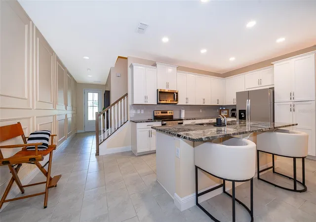 Photo 2 of Townhouse for sale at 1660 Tropical Palms Cir, Kissimmee, FL 34747 | MLS# O6325817 | Listing updated on 2026-08-23
