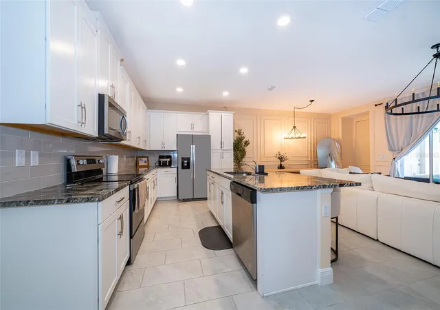 Photo 3 of Townhouse for sale at 1660 Tropical Palms Cir, Kissimmee, FL 34747 | MLS# O6325817 | Listing updated on 2026-08-23