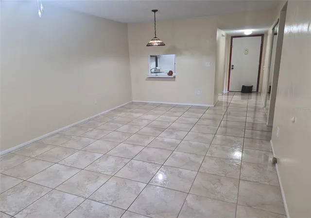 Photo 3 of Condo for sale at 2806 N Powers Dr #8, Orlando, FL 32818 | MLS# O6325907 | Listing updated on 2026-10-01