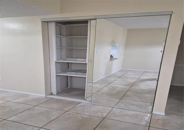 Photo 3 of Condo for sale at 2806 N Powers Dr #8, Orlando, FL 32818 | MLS# O6325907 | Listing updated on 2026-10-01