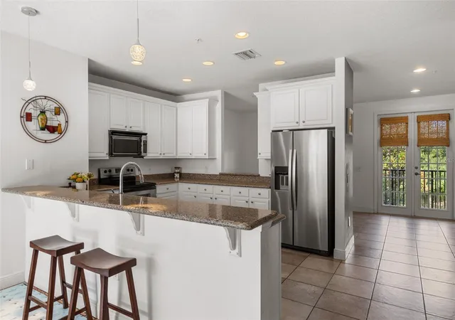 Photo 4 of Townhouse for sale at 668 Pensacola Ln, Lake Mary, FL 32746 | MLS# O6327625 | Listing updated on 2026-09-28
