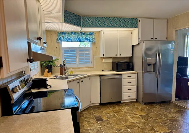Photo 2 of Manufactured home for sale at 203 Estrada, North Port, FL 34287 | MLS# A4659090 | Listing updated on 2026-04-28