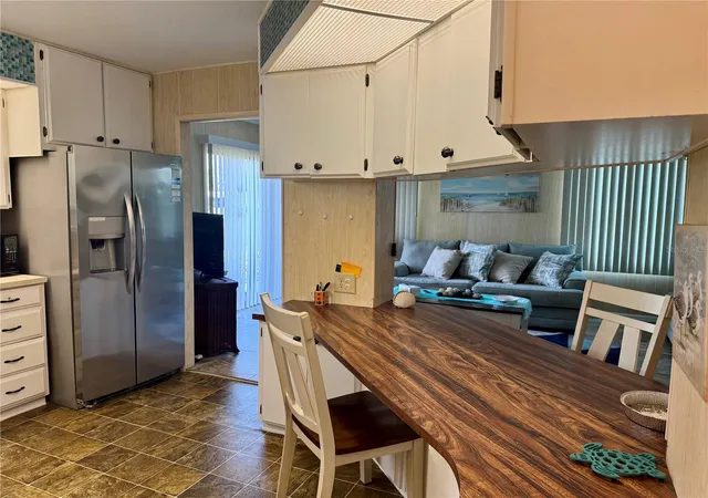Photo 3 of Manufactured home for sale at 203 Estrada, North Port, FL 34287 | MLS# A4659090 | Listing updated on 2026-04-28