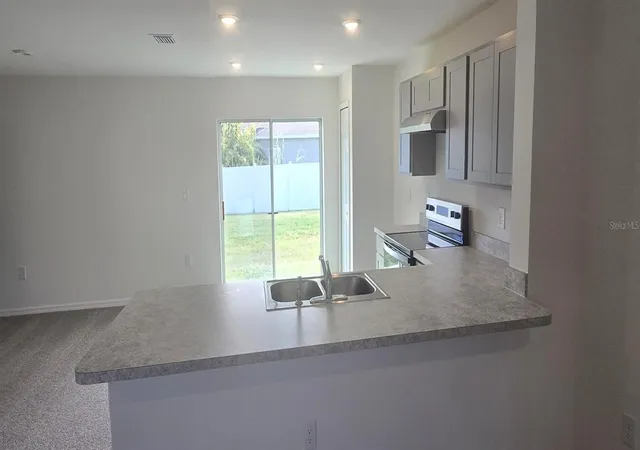 Photo 4 of Single family home for sale at 410 Danube Dr, Kissimmee, FL 34759 | MLS# C7512634 | Listing updated on 2026-10-20