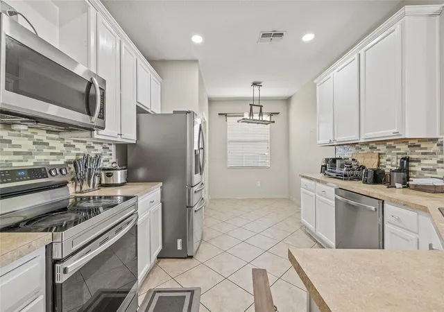 4th image of 8521 Southern Charm Cir, Brooksville, FL 34613 | MLS# TB8409386