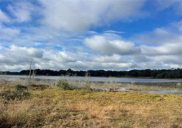 1st image of Grays Airport Rd, Lady Lake, FL 32159 | MLS# O6329024