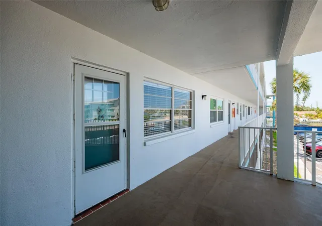 Listing Photo 1 - Condo for sale in building located at 1893 Shore Dr S, South Pasadena, FL 33707 - Unit #209