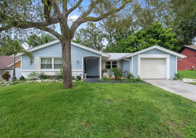 Photo 1 of Single family home for sale at 12514 Coffee Hill Row, Hudson, FL 34667 | MLS# W7877579 | Listing updated on 2026-07-04