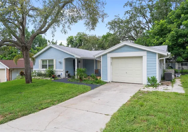 Photo 3 of Single family home for sale at 12514 Coffee Hill Row, Hudson, FL 34667 | MLS# W7877579 | Listing updated on 2026-07-04