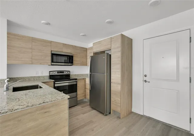 Listing Photo 2 - Condo for sale in building located at 1230 Southstation Pl, ORLANDO, FL 32809 - Unit #105