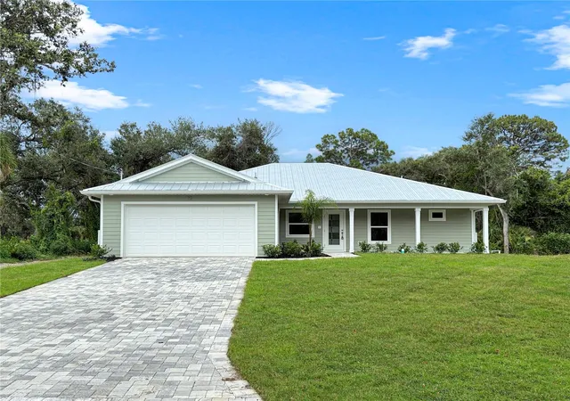 Photo 1 of Single family home for sale at 32 Purcell St, Port Charlotte, FL 33954 | MLS# C7512952 | Listing updated on 2026-03-31
