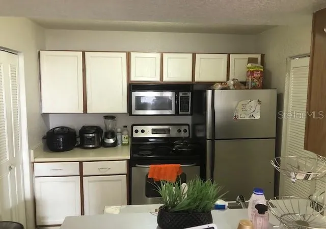 Homes for sale in Orlando, FL | 1025 S Hiawassee Road, Orlando, FL 32835 | Houzeo