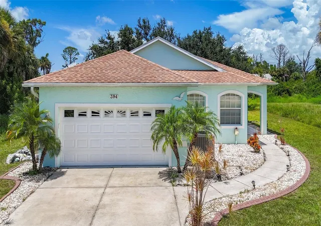 1st image of 394 Sunset Rd N, Rotonda West, FL 33947 | MLS# A4661062