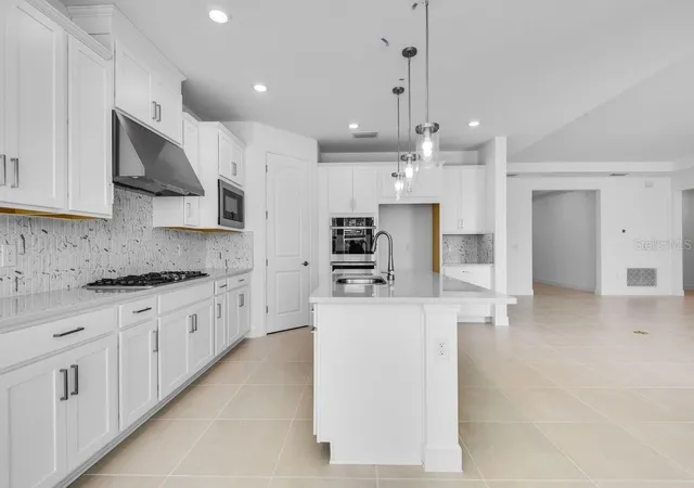 Photo 4 of Single family home for sale at 672 Junonia Blvd, New Smyrna Beach, FL 32168 | MLS# O6334874 | Listing updated on 2026-09-22