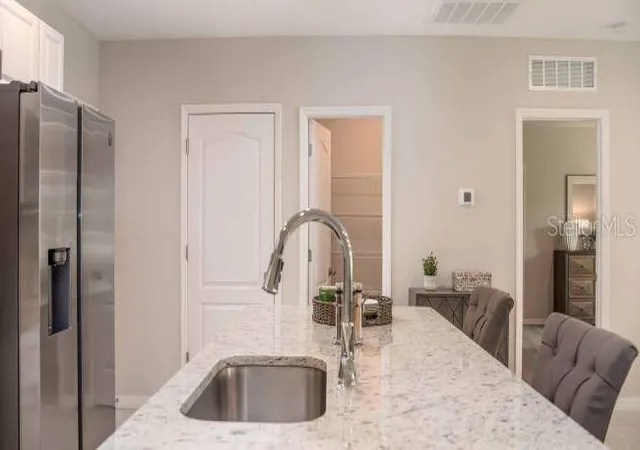 Photo 4 of Single family home for sale at 11902 Van Loon Ave, Port Charlotte, FL 33981 | MLS# O6335304 | Listing updated on 2026-03-03