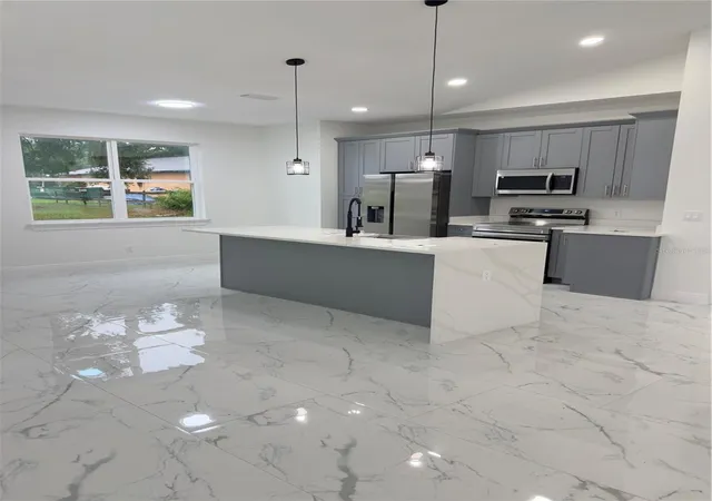 Photo 2 of Single family home for sale at 12320 Se 70th Avenue, Belleview, FL 34420 | MLS# O6336321 | Listing updated on 2026-08-05