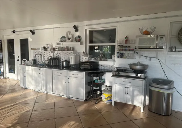 Photo 9 of Single family home for sale at 10520 Henderson Rd, Tampa, FL 33625 | MLS# TB8419027 | Listing updated on 2025-12-23