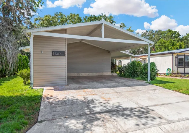 1st image of 34310 Lodge Dr, Wesley Chapel, FL 33543 | MLS# TB8421342