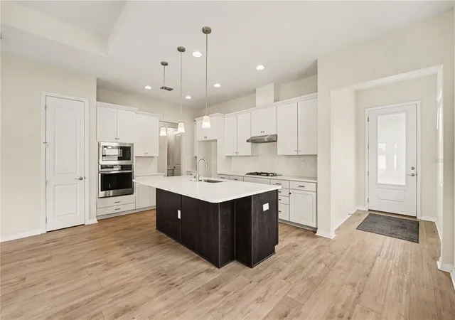 Photo 3 of Single family home for sale at 1991 Key Bay Trl, Kissimmee, FL 34747 | MLS# TB8421378 | Listing updated on 2026-08-25