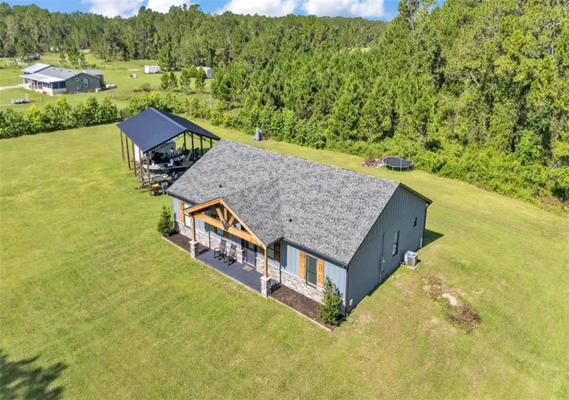 1st image of 18940 Commonwealth Ave N, Polk City, FL 33868 | MLS# L4955506