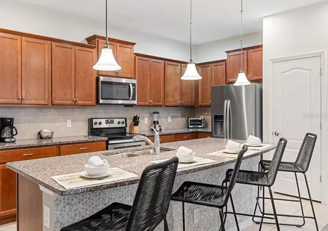Photo 2 of Townhouse for sale at 2402 Dubai St, Kissimmee, FL 34747 | MLS# O6341750 | Listing updated on 2026-05-21