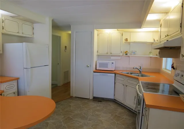 Photo 3 of Manufactured home for sale at 705 Blackburn Blvd, North Port, FL 34287 | MLS# A4664125 | Listing updated on 2026-09-05