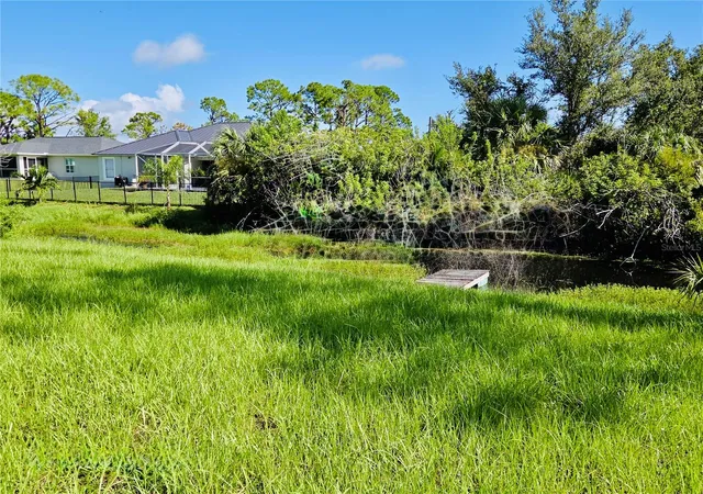 Photo 2 of Single family home for sale at 14108 Chesswood Ln, Port Charlotte, FL 33981 | MLS# O6341943 | Listing updated on 2026-09-14