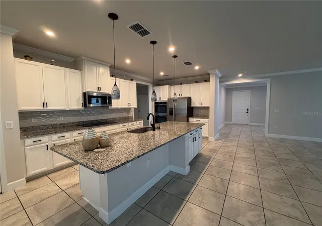Photo 3 of Single family home for sale at 2936 Slough Crk Dr, Kissimmee, FL 34744 | MLS# S5134409 | Listing updated on 2026-09-15