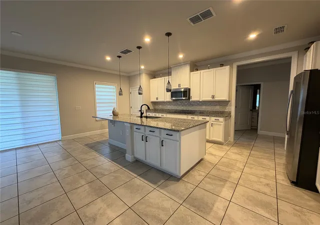 Photo 3 of Single family home for sale at 2936 Slough Crk Dr, Kissimmee, FL 34744 | MLS# S5134409 | Listing updated on 2026-09-15